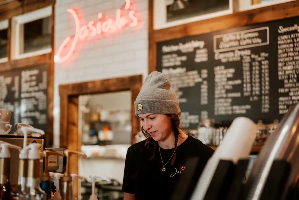 A member of the team working the counter at Josiah's
